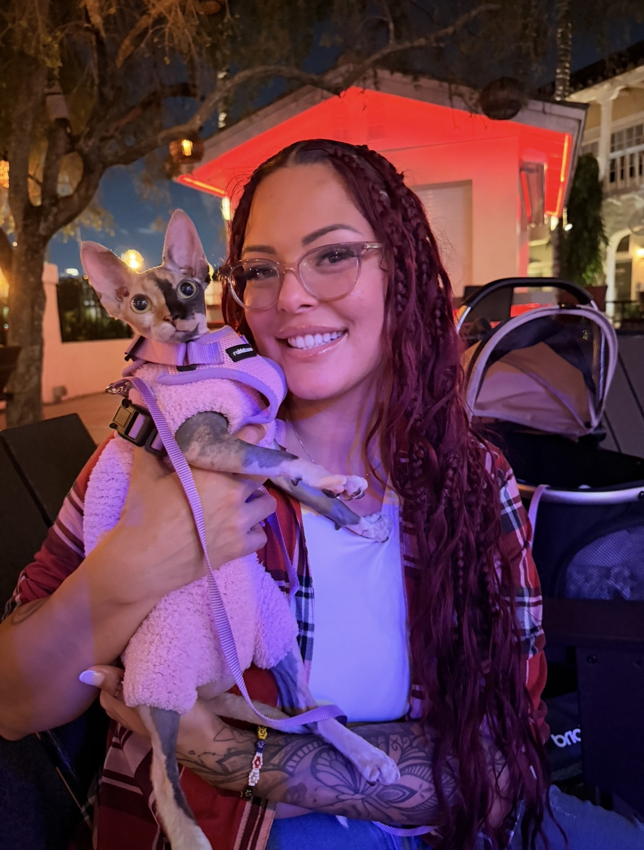 Kathyleen, the owner of Blissful Sphynx Cattery, holding Kali